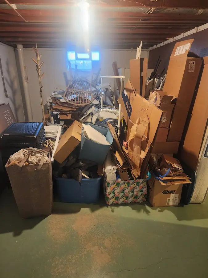 Roll-off dumpster container at job site for Yard Waste Dumpster Rental in Central Park